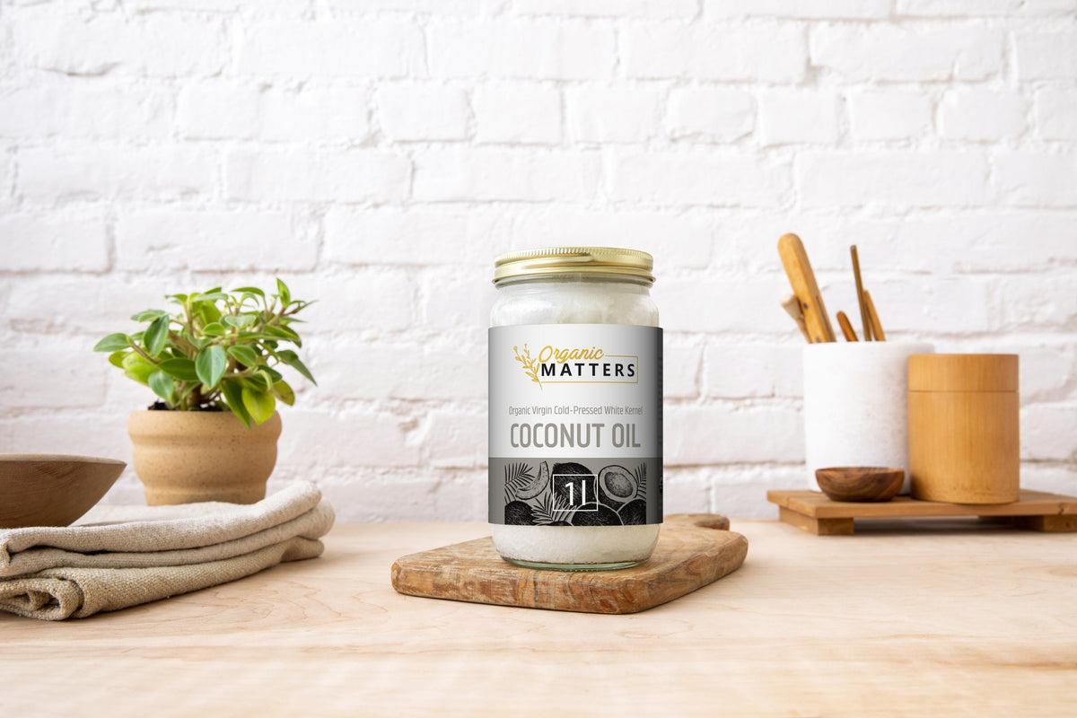 Organic Matters Coconut Oil White Kernel jar on a kitchen counter